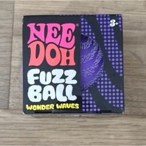 Schylling NeeDoh Fuzz Ball Wonder Waves Stress squish - Purple. FastSafeship